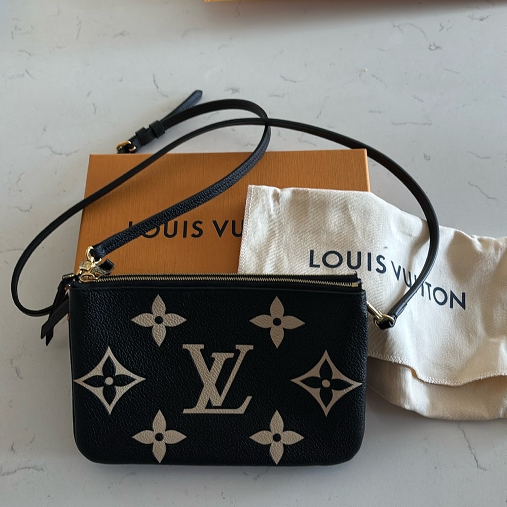 Authentic Louis Vuitton Double Zip Pochette.